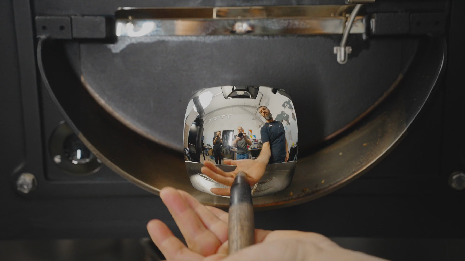 video of coffee roster pouring rostered coffee beans